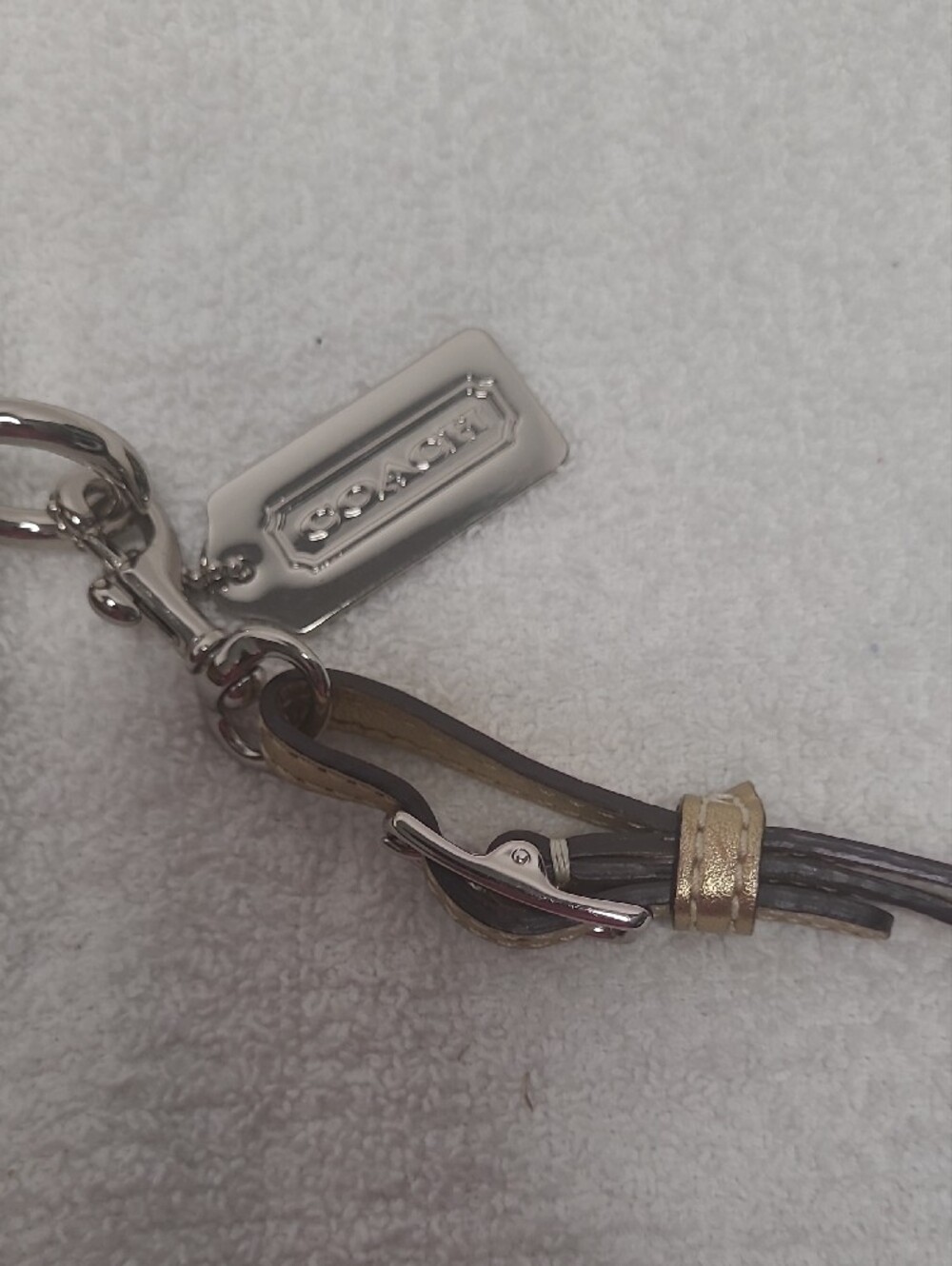 COACH Gold Metallic Signature Turnlock Wristlet - Picture 5 of 10